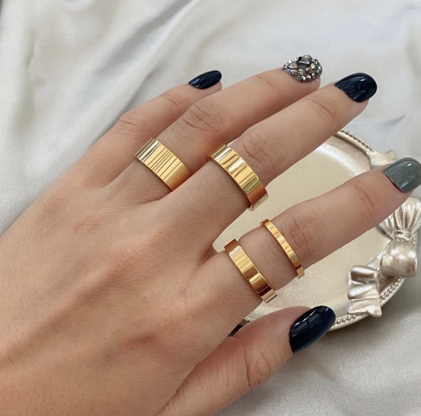 Various rings with different widths for fashion or wedding bands.